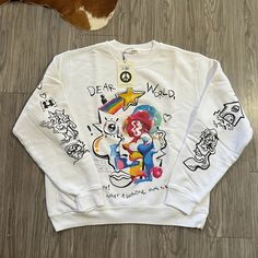 Limited Edition Fewocious Nft Artist Collaboration For Madhappy Super Soft White Fleece Crewneck Sweatshirt With All Over Hand Painted Print Design By Fewocious Size M Oversized Fit Matching Shorts Available Cotton Graffiti Print Long Sleeve Sweatshirt, Winter White Sweatshirt With Graffiti Print, Trendy Long Sleeve Sweatshirt With Graffiti Print, White Long Sleeve Sweatshirt With Graffiti Print, Trendy White Fleece Sweater, White Cotton Sweater With Graphic Print, White Long Sleeve Top With Graffiti Print, Winter Graffiti Print Relaxed Fit Sweatshirt, White Graphic Print Sweater For Winter