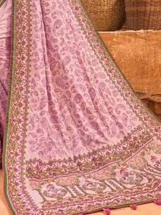 Adorn yourself in the exquisite charm of this pink banarasi silk saree, a testament to timeless beauty and sophistication. The lustrous silk material drapes gracefully, creating an enchanting canvas for the meticulous kachhi work, delicate diamond embellishments, and mesmerizing mirror work.
The ensemble is completed with a matching silk blouse, mirroring the saree's elegance with kachhi work, diamond detailing, and mirror work. The unstitched blouse material allows for customization, ensuring a Pink Raw Silk Pre-draped Saree With Dupatta, Pink Raw Silk Pre-draped Saree With Resham Embroidery, Pink Anarkali Style Silk Pre-draped Saree, Pink Silk Pre-draped Saree In Traditional Style, Traditional Pink Silk Pre-draped Saree, Pink Raw Silk Pre-draped Saree For Puja, Festive Pink Silk Pre-draped Saree, Pink Katan Silk Pre-draped Saree For Festivals, Traditional Pink Katan Silk Pre-draped Saree