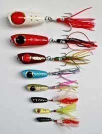 several different types of fishing lures lined up in a row