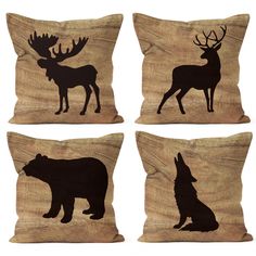 four pillows with animals on them and one is black, the other has brown color