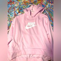 Never Worn Yl (Xs Woman Fits Too) Pink Nike Hoodie. It Is Cropped Slightly In The Front. Smoke Free Home Bought From Nike.Com. Nike Cotton Hoodie With Letter Print, Nike Cotton Hooded Top, Nike Hooded Top With Letter Print, Pink Nike Hoodie With Crew Neck, Nike Hooded Top For Loungewear, Nike Loungewear Top With Drawstring Hood, Nike Tops With Drawstring Hood For Loungewear, Nike Crew Neck Hoodie For Spring, Nike Pink Hoodie With Drawstring Hood