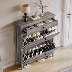 a wooden shoe rack with several pairs of shoes on it and a lamp next to it