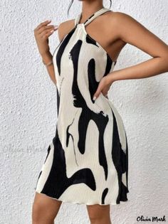 Olivia Mark - Sleeveless Floral Halter Neck Dress Trendy White Halter Neck Dress, Trendy White Halter Neck Mini Dress, Sleeveless Non-stretch Mini Dress For Summer, Black Non-stretch Sleeveless Mini Dress, Printed Halter Neck Mini Dress For Party, Casual Printed Sleeveless Dress For Party, Casual Printed Sleeveless Party Dress, Spring Party Sleeveless Printed Dress, Trendy Sleeveless Halter Dress For Vacation