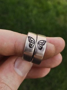 Butterflies represent change, and the courage to embrace a transformation that makes life better. Get this matching butterfly wing ring set for your best friend, sister, or partner. Featuring a gorgeous detailed butterfly wing on each ring. DETAILS: -Two Matching Rings -Each ring is hand stamped -Ring is Aluminum, Sterling Silver, Fine Silver, Rose Gold Filled, or 14k Gold Filled -6mm in thickness**Please note, this ring is OPEN BACK and adjustable** You will receive two hand-stamped rings fille Matching Rings For Siblings, Best Friend Rings Aesthetic, Matching Promise Rings Aesthetic, Matching Friendship Rings, Matching Best Friend Gifts, Best Friend Promise Rings, Silver Butterfly Charm Jewelry For Promise, Adjustable Rose Gold Jewelry With Butterfly Charm, Rose Gold Adjustable Jewelry With Butterfly Charm