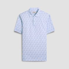 The Victor geometric print OoohCotton short-sleeved polo shirt featuring a three-button placket, mother-of-pearl buttons, and a self-fabric collar is the ideal choice for looking and feeling your best, whether you are enjoying a casual day or performing on the golf course. OoohCotton is a performance, double-mercerized, wrinkle-resistant, breathable, and easy-care cotton blend with 8-way stretch, quick-dry, and thermal comfort properties. Fitted Light Blue Short Sleeve Polo Shirt, Light Blue Fitted Polo Shirt With Polo Collar, Fitted Light Blue Polo Shirt With Polo Collar, Fitted Light Blue Polo Shirt, Light Blue Polo Shirt For Spring, Light Blue Summer Polo Shirt, Blue Johnny Collar Polo Shirt For Summer, Light Blue Short Sleeve Polo Shirt For Summer, Blue Golf Shirt For Summer