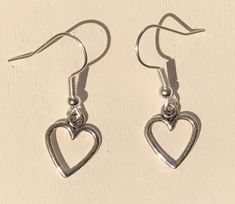 Tibetan silver heart drop earrings  Silver plated wires or choose 925 silver wires Drop length 2.5cm Adjustable Heart Shaped Drop Earrings, Adjustable Pierced Heart Drop Earrings, Metal Open Heart Earrings For Gift, Hypoallergenic Metal Heart Drop Earrings, Gift Metal Open Heart Earrings, Nickel-free Silver Open Heart Earrings, Silver Adjustable Dangle Heart Earrings, Adjustable Silver Dangle Heart Earrings, Silver Open Heart Nickel-free Earrings