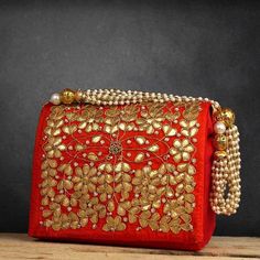 Salamender Orange Hand Crafted Clutch Handbag With Beaded Chain For Women | indian wedding evening bag clutch | fabric clutch purse handmadeHandmade Gotta Patti Work Clutch(For Traditional Indian Wedding) Suitable for every special occasion.Add grace to your dressings.Perfect For Weddings.These bags can be also used for gift purpose . Bollywood Style Shoulder Bag With Zari Work, Festive Clutch Shoulder Bag For Festivals, Festival Wedding Bags With Mirror Work, Elegant Wedding Bags With Mirror Work For Festivals, Festive Mirror Work Shoulder Bag As Gift, Festive Evening Bag With Zari Work, Gold Rectangular Shoulder Bag With Dori Work, Festive Dori Work Clutch As A Gift, Bollywood Style Festive Shoulder Bag With Handwork