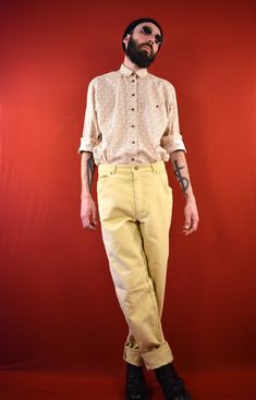 "Very soft and comfy Unisex Vintage Pants from the early 70s by the Brand \"Dribbling\". The pants are made of 100% Cotton. Conditions: New Size on label: 50 Dimensions: Waist: 40cm Inner Leg Length: 85cm Front Rise: 30cm If this item is not automatically shipped to your Country, please get in touch with us! Please check our Shop Policies in the \"About\" section at the bottom of our main shop page: https://www.etsy.com/shop/AntimodeVintage Eco Choice! Buying Vintage items reduces the environmen Retro Beige Cotton Bottoms, Vintage Beige Pants For Spring, Spring Vintage Full Length Pants, Vintage Beige Relaxed Fit Bottoms, Vintage Spring Pants With Pockets, Retro Cotton Tapered Leg Pants, Retro Cotton Pants With Relaxed Fit, Retro Style Relaxed Fit Full Length Pants, Vintage Relaxed Fit Trousers