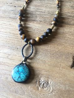 Earthy handbeaded Tiger’s Eye, Mala and heishi with a stunning handsoldered natural turquoise pendant. -17” adjustable length African Turquoise, Taos, Quartz Pendant, Turquoise Pendant, Natural Turquoise, Hand Beading, Vintage Designs, Jewelry Necklaces, Turquoise