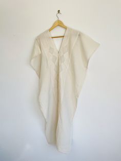 You can't really do summer without a comfortable, versatile tunic dress that's perfect as cover up or a quick trip to town. This casual cotton tunic dress, handmade in Oaxaca with natural dyes, is just what you need! Soft natural tones in a variety of colors offer a unique addition to your summer beach vibe. Handcrafted by skilled artisans using traditional techniques, each dress is made with care and attention to detail. The soft, lightweight cotton fabric and loose, relaxed design make this dr Beige Cotton Linen Dress For Vacation, Oversized Cotton Linen Vacation Dress, Oversized Cotton Linen Dress For Vacation, Oversized Cotton Summer Dress, Festival Cotton V-neck Cover-up, Summer Cotton Boho Festival Dress, Beige Cotton Boho Dress For The Beach, Cotton Tunic Cover-up For Summer, Summer Cotton Tunic Cover-up