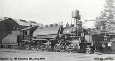 an old black and white photo of a train engine