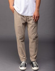 Rsq Twill Jogger Pants. Twill Jogger With 4-Way Stretch. Elastic Drawstring Waist. Side Slip Pockets. Small Right Side Zip Pocket. Back Right Welt Button Pocket. Elastic Cuffs. 97% Cotton 3% Spandex. Machine Wash. Imported.size + Fitshort: 27" – 30" Inseam Regular: 29" – 32" Inseam Tall: 31" – 34" Inseam Model Is 6'1" Wearing A Size Medium. Casual Tapered Leg Summer Chinos, Casual Cotton Pants For Everyday, Casual Summer Sweatpants For Everyday, Casual Pants With Tapered Leg For Everyday, Casual Khaki Bottoms For Streetwear, Casual Everyday Pants With Tapered Leg, Everyday Khaki Relaxed Fit Bottoms, Khaki Summer Pants For Everyday Wear, Casual Tapered Leg Pants For Everyday