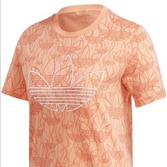 Regular Fit Ribbed Crewneck Short Sleeve Trefoil Shirt Trendy Adidas T-shirt For Spring, Spring Red T-shirt With Logo Print, Sporty Orange Top For Spring, Sporty Summer T-shirt With All Over Print, Adidas Cotton Short Sleeve Top, Sporty Short Sleeve Tops With All Over Print, Trendy Adidas Tops With Logo Print, Adidas Pink Short Sleeve T-shirt, Pink Adidas Cotton T-shirt