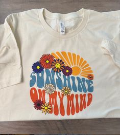 Cute retro graphic tee. Sunshine on my mind. Trendy Cotton T-shirt With Retro Print, Spring Fun Graphic T-shirt, Vintage Text Print T-shirt For Spring, Retro Cotton T-shirt For Spring, Cotton Pop Culture T-shirt For Spring, Pop Culture Cotton T-shirt For Spring, Pop Culture Graphic Design T-shirt For Spring, Retro Graphic Print T-shirt For Spring, Spring Pop Culture Graphic T-shirt