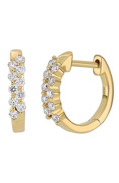 These elegant huggie hoops are handcrafted from 18-karat gold and lined with 10 off-set round diamonds. 1/2" hoop diameter; 1/8" width Total diamond weight: 0.28ct. Color: G Clarity: VS1 18k gold/diamond Imported >Diamond Guide Fine Jewelry Huggie Earrings With Prong Setting, Formal Yellow Gold Huggie Earrings With Pave Setting, Formal Yellow Gold Huggie Earrings With Brilliant Cut, Gold Round Huggie Earrings With Brilliant Cut, Small Hoop Yellow Gold Huggie Earrings With Diamond Cut, Fine Jewelry Yellow Gold Brilliant Cut Hoop Earrings, Luxury Brilliant Cut Huggie Earrings, Yellow Gold Huggie Earrings For Anniversary, Yellow Gold Brilliant Cut Hoop Earrings