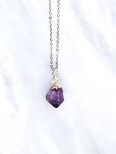 Welcome to JewelsbyGaia! ♡ Every day Raw Amethyst Crystal Necklace. ♡ The Amethyst pendants approximately measure to 2 - 2,5 cm by 1 - 1,5 cm. (Each crystal is slightly different in size). ♡ The necklace is made of stainless steel and is available in 5 different lengths. Please choose the right length of the necklace upon checkout. ♡ Lobster clasp closure. ♡ Also Available in Long-lasting real goldplating. ♡ Materials that are used for this necklace are 100% BRAND NEW. ♡ Each Crystal is natural, Purple Crystal Necklace With Stones As A Gift, Purple Crystal Necklaces As Gift, Purple Crystal Necklaces With Stones For Gift, Gift Purple Crystal Necklace, Purple Necklace With Large Stone For Gift, Spiritual Purple Birthstone Necklace, Purple Jewelry With Large Stone For Healing, Spiritual Purple Gemstone Crystal Necklace, Amethyst Birthstone Pendant Crystal Necklace