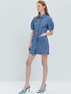 This soft shirt dress with the perfect pop of pretty.A smooth fabric with comfort stretch and a soft texture.It's easy to wear, comfortable and looks good with just about everything. - Standard collar and button down dress- Ready for those special occasions a tailored look is needed or mix it up with your favorite everyday pieces- Meet our crisp and light weight shirt dress- Puff sleeves and stitch details - Soft and lightweight with polyester blend Spring Denim Dress With Relaxed Fit And Button Closure, Spring Denim Dress With Button Closure And Relaxed Fit, Relaxed Fit Knee-length Denim Dress With Buttons, Knee-length Denim Dress With Buttons In Relaxed Fit, Relaxed Fit Short Sleeve Denim Dress, Relaxed Fit Short Sleeve Denim Dress For Day Out, Chic Relaxed Fit Denim Dress With Button Closure, Spring Button-up Denim Dress In Relaxed Fit, Spring Button-up Relaxed Fit Denim Dress