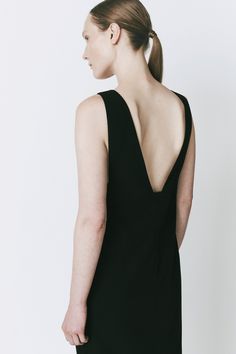 Black midi dress with a loose fit and sheer inner layer. Crafted for understated elegance, ideal for evening gatherings. Fall Cocktail Dress, Fall Cocktail, Black Shift Dress, Vintage Lifestyle, Fall Cocktails, Lifestyle Art, Trench Jacket, Jean Accessories, Shift Dress Black