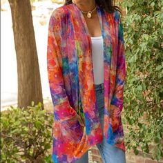 Flowy Open Cardigan Featuring Convenient Side Pockets And Long Sleeves To Keep You Covered. Note: Due To The Manner In Which Fabric Is Cut, Pattern Layouts May Vary. Size M: 35'' Long From High Point Of Shoulder To Hem Size 1x: 36.5'' Long From High Point Of Shoulder To Hem Knit 95% Polyester / 5% Spandex Machine Wash; Hang Dry Imported Multicolor Floral Print Open Front Outerwear, V-neck Multicolor Outerwear For Spring, Multicolor Open Front Outerwear With Floral Print, Multicolor Long Sleeve Cardigan For Spring, Casual Multicolor Floral Print Cardigan, Trendy Multicolor Open Front Cardigan, Casual Multicolor Cardigan With Pockets, Multicolor Floral Print Long Sleeve Cardigan, Multicolor Open Front Cardigan For Spring