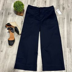 Wide Leg Chino Pants By Ralph Lauren Color Navy Blue Cut In A Wide-Leg, Cropped Silhouette, Lightweight Stretch-Cotton Twill Waist From Side To Side 16” Rise12” Leg 23.5”(Inseam) Hips 19.5” High-waist Cotton Capris For Work, High Waist Cotton Capris For Work, Navy Wide-leg Bottoms For Workwear, Navy Wide Leg Bottoms For Work, Navy Wide-leg Workwear Bottoms, Navy Relaxed Fit Bottoms For Workwear, Navy Wide-leg Bottoms With Pockets, Navy Wide-leg Workwear Pants, Navy Relaxed Fit Bottoms For Spring