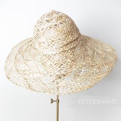 Made from natural undyed open weave strip straw and twisted jute braid, this capeline has a nice big brim so you can make the summer hat of all summer hats! They all have their own personality, some are more closely woven, some have more colour variation. A true sign that each one is unique and ultimately handmade. Capeline measures: Flat measurement from crown tip to brim: 30.4cm (12 inches) Brim width from side crown to brim edge: 11cm (4.3 inches) *Please note that this is not a finished hat Natural Handwoven Sun Hat For Spring, Spring Natural Handwoven Sun Hat, Spring Natural Color Handwoven Sun Hat, Artisan Woven Straw Hat For Summer, Curved Brim Open Weave Toquilla Straw Hat, Open Weave Toquilla Straw Hat With Curved Brim, Spring Straw Hat With Open Weave And Flat Brim, Spring Curved Brim Straw Hat With Open Weave, Toquilla Straw Hat With Open Weave And Curved Brim