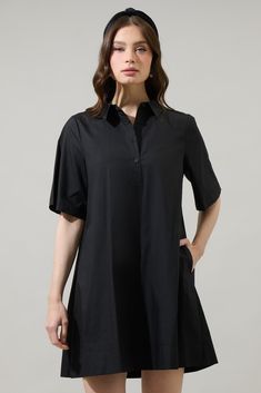 The Danbury Collared Trapeze Mini Dress will have you wanting to spend the day out. It features short sleeves and a button up front leading to a collared neck. The back has an inverted pleat design. It can be easily paired up with sandals or strappy heels. - Pockets- Flutter sleeves- Button up- Boxy fit- Comes in 2 colorsSize + Fit - Model is 5'8" and wearing size XS- Measurements taken from size S - Chest: 19 1/2"- Length: 34 1/2" Fabric Self: 100% Cotton Style Number STD14556 Short Sleeve Shirt Dress For Day Out, Collared Short Sleeve Dress For Summer Workwear, Fitted Collared Short Sleeve Dress, Chic Short Sleeve Shirt Dress, Chic Solid Color Short Sleeve Shirt Dress, Classic Short Sleeve Dress With Button Closure, Short Sleeve Shirt Dress With Buttons For Work, Fitted Short Sleeve Dress With Rolled Sleeves, Solid Color Short Sleeve Shirt Dress With Button Closure