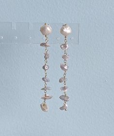 Product Description: Introducing our exquisite Freshwater Keishi Pearl and 24K Gold Filled Post Earrings, perfect for those seeking a timeless and elegant accessory. These earrings feature a captivating combination of delicate freshwater pearls and lustrous gold, creating a truly enchanting piece of jewelry. Handcrafted with precision and attention to detail, these earrings are designed to enhance your natural beauty and make a statement on any occasion. Highlights: - Made with high-quality 24K Everyday Earrings Simple, Purple Dangle Earrings, Real Pearl Earrings, Everyday Earrings Studs, Long Chain Earrings, Triangle Earrings Stud, Chalcedony Earrings, Rose Quartz Earrings, Bride Earrings