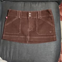 Mini Skirt Fitted Mini Skirt Casual Style, Casual Brown Lined Skirt, Y2k Style Lined Skort, Brown Mini Skort, Brown Cotton Mini Skirt With Relaxed Fit, Y2k Style Brown Skirt For Spring, Casual Mini Skort With Lined Skirt, Brown Y2k Skirt For Spring, Casual Brown Skirted Skort