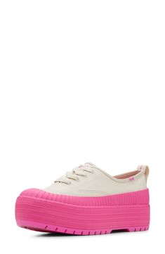 Elevate your sneaker game with this classic canvas shoe set on a chunky platform cupsole with pronounced lugs. Lace-up style Textile upper and lining/rubber sole Imported Pink Sporty Platform Sneakers With Gum Sole, Pink Low-top Thick Bottom Sneakers, Pink Thick Bottom Sneakers For Streetwear, Pink Low-top Platform Sneakers With Thick Sole, Pink Low-top Platform Sneakers With Thick Bottom, Pink Platform Sneakers With Gum Sole And Round Toe, Pink Sporty Platform Sneakers With Vulcanized Sole, Trendy Pink Platform Sneakers With Vulcanized Sole, Sporty Pink Platform Sneakers With Vulcanized Sole