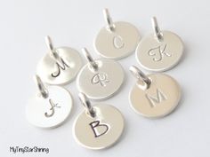 This listing is for one of these tiny Round Initial Simple and stylish this initial pendant is fashioned in fine sterling silver. The disc-shaped pendant can be customized with one engraved Script or Block initial. ★*Sterling silver Disc : 3/8 Inch ( 9.5 mm) Chain not include) Back to my shop : http://www.etsy.com/shop/mytinystarshining Personalized Silver Charm Necklaces With Initials, Personalized Silver Monogram Charm Necklace, Personalized Monogram Silver Charm Necklace, Silver Charm Necklaces With Initials For Personalized Gift, Sterling Silver Initial Pendant Charms For Anniversary, Silver Sterling Initials Charm Necklace, Silver Sterling Initials Charm Necklaces, Silver Sterling Silver Initials Charm Necklace, Silver Monogram Pendant Charm Necklace