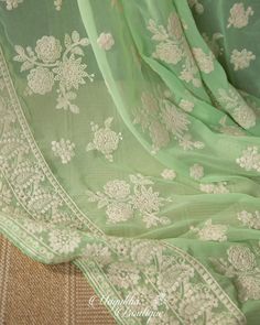 "Much Demand for these Lovely Chikankari on Pure Gorgette silk sarees ❤️❤️❤️ Rock your parties with this subtle Pastel Green Chikankari Pure Gorgette silk saree with all over Hand Chikankari work in white color threads. Theme: A Rose Garden Blouse is complemented in size 38\" and is expandable upto 44\" *Fall, Pico & Tassels : Done *Condition : New Saree With Stitched Blouse *Ready to Wear *Dry Clean Only Blouse: Pattern blouse with front buttons. Padded. Size 38\" expandable up to 42/44 or can Designer Pista Green Dupatta With Chikankari Embroidery, Pista Green Dupatta With Chikankari Embroidery For Designer Wear, Bollywood Style Pista Green Dupatta With Chikankari Embroidery, Pista Green Chikankari Embroidered Fabric For Designer Wear, Traditional Georgette Blouse With Chikankari Embroidery, Pista Green Dola Silk Traditional Wear With Chikankari Embroidery, Pista Green Chikankari Embroidered Fabric For Wedding, Pista Green Chikankari Embroidered Traditional Dola Silk Wear, Transitional Georgette Blouse Piece With Resham Embroidery