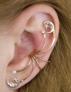 This beautifully spectacular ear cuff is bound to make a statement for you Celestial Jewelry lovers! This Ear Cuff decorates the ear from top to bottom. It hugs the ear in the center of the ear comfortably and securely without piercing and decorates the entire ear. We use only the highest quality materials 14K Gold Filled and Sterling Silver. This item will ship in a Gift Box with easy fitting instructions. Ready for gift giving! Star Ear Cuff, Adjustable Celestial Cartilage Earrings, Adjustable Celestial Single Cartilage Earring, Moon Phases Jewelry, Moon Phase Jewelry, Outfit Planning, Prom Outfit, Ear Crawler, Wrap Earrings