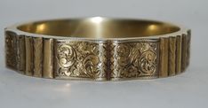 Offered is a silver bracelet which has a gold wash and is engraved with floral motif. In good condition with minor scratches consistent with normal use. We have not cleaned or polished this. Please see all pics for size and detail, they are part of the description.  SKU# 724.2834 Buying and selling antiques since 1969, everything we sell is guaranteed to be vintage or antique. REALLY IMPORTANT STUFF YOU NEED TO READ, because we'll know if you didn't. * RETURNS: All Sales are Final. Sorry, no refunds, returns, or exchanges unless the item has been grossly misrepresented in the description or pics. All of our items are vintage and/or antique so are not perfect. If there are questions about the description, please ask before purchasing. * Sizes posted are close approximations and not exact me Ornate Stamped Bracelets For Formal Occasions, Antique Etched Yellow Gold Bracelet, Antique Engraved Yellow Gold Cuff Bracelet, Antique Etched Gold Bangle Bracelet, Antique Gold Engraved Bracelet, Antique Etched Bracelets For Wedding, Antique Etched Bracelets For Formal Occasions, Victorian Engraved Cuff Bracelet For Ceremonial Occasion, Ornate Engraved Bangle For Formal Occasions