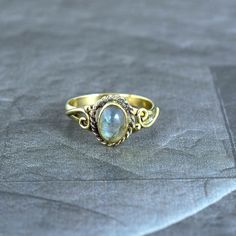 Labradorite Ring/Handmade Ring/Dainty Ring/Unique Ring/Statement Ring/Women Ring/Vintage Ring/Boho Ring/Promise Ring/Anniversary gift/Gifts For Her METAL :- Brass FINISH :- gold STONE :- Labradorite Ring can be customized on request and gemstone can be made to any gemstone you want. Same Design Ring Are Upload With Any Gemstone. Please Visit Our Shop to View Complete Collection. If You Need Faster Shipping, Please Contact us Please Make Sure to Include The Correct Address During Before Order. Yo Handmade Spiritual Open Opal Ring, Gold Oval Moonstone Bohemian Ring, Bohemian Gold Oval Moonstone Ring, Handmade Bohemian Oval Moonstone Ring, Antique Handmade Promise Ring, Gold Bohemian Moonstone Ring For Anniversary, Vintage Handmade Moonstone Rings, Bohemian Opal Ring Birthstone Gift, Bohemian Opal Birthstone Ring For Gift