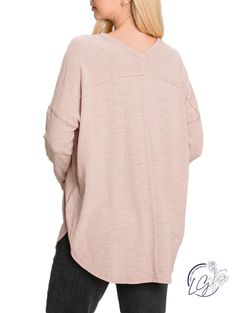 Casual v-neck long sleeve top. Features a drop shoulder for a relaxed look. Lightweight fabric makes this shirt easy to wear inside and outside the home. Fabric: 49% Polyester, 36% Cotton, 11% Acrylic, 4% Spandex Relaxed V-neck Tops For Fall, Fall Long Sleeve V-neck Top, Oversized Comfortable V-neck Top, Oversized Beige Casual V-neck Sweater, Oversized Beige V-neck Sweater, Casual V-neck Top For Fall Loungewear, Fall Long Sleeve V-neck Top Relaxed Fit, Fall V-neck Long Sleeve Top In Relaxed Fit, Oversized V-neck Long Sleeve Top For Fall