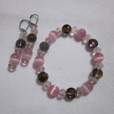 Handmade With Glass Beads. Silver Tone, Nickel Free Ear Wire. This Bracelet Is Stretch. Nwot. Marble Beads Bracelet, Pink Glass Beaded Bracelets, Pink Glass Beaded Bracelets As Gift, Pink Whimsical Beaded Bracelets, Glass Bead Bracelet, Whimsical Pink Bracelets With Colorful Beads, Handmade Pink Glass Bracelets, Pink Czech Glass Bracelet, Beaded Jewelry Bracelets