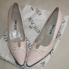 Brand New, Unworn. Versatile And Chic Leather Pumps By Pancaldi Italy. Made From Incredibly Soft Blush-Hued Leather With Kitten Heels. Preowned/Vintage. Comes With Dust Bag. Tagged Size 8 B. Heel - 2.4in H. Great For Weddings, Graduations, Holidays And Any Special Occasion. Made In Italy. Marked Size: 8b Ships Fast From Smoke And Pet Free Home. Formal Cream Leather Kitten Heels, Cream Pointed Toe Kitten Heels For Formal Occasions, Feminine Formal Court Shoes With Round Toe, Cream Flat Heel Court Shoes For Formal Occasions, White Leather Classic Kitten Heels, Classic White Leather Kitten Heels, Chic White Kitten Heels With Leather Sole, Formal Beige Kitten Heels With Almond Toe, Beige Almond Toe Kitten Heels For Formal Occasions