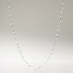 Crafted in 2.18 grams of 18K White Gold, the necklace contains 47 stone of Pear Shaped Rose Cut Natural Diamond with a total of 3.51 carat in E-F color and VVS-VS clarity. The necklace length is 18 inches. Elegant White Gold Chain Necklace For Everyday Luxury, Elegant Everyday White Gold Chain Necklace, Elegant Everyday Luxury White Gold Chain Necklace, Delicate White Diamond Necklace With Delicate Chain, White Diamond Necklace With Delicate Chain, Luxury White Necklace With Delicate Chain, White Luxury Necklace With Delicate Chain, Luxury White Clavicle Chain Necklace, White Cable Chain Necklace For Formal Occasions