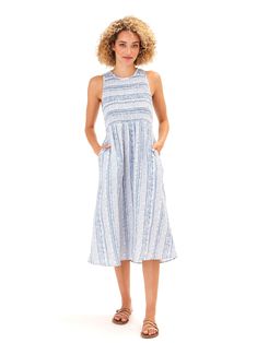 Experience ultimate comfort and style with our Adrienne Gauze Smocked Midi Dress. Made from 100% organic cotton gauze, this dress features a smocked fitted top for a flattering fit. The midi length allows for easy movement, while the breathable and stretchy fabric adds to the overall comfort. Also, it has pockets! Beach Midi Dress With Gathered Waist In Cotton, Beach Linen Dress With Smocked Bodice, Linen Smocked Dress For Daywear, Casual Cotton Smocked Dress With Smocked Cuffs, Summer Linen Smocked Dress, Smocked Linen Dress For Vacation, Summer Linen Smocked Dress With Smocked Back, Breezy Cotton Dress With Smocked Back, Flowy Cotton Smocked Midi Dress