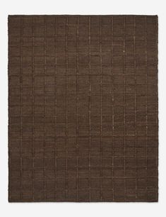 a brown rug with squares on it