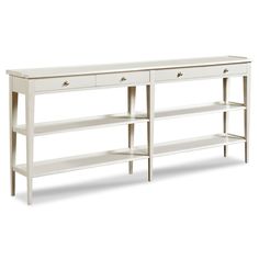 a white console table with two drawers on one side and an open shelf on the other