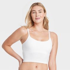 Give your everyday intimates a comfy upgrade with this Cotton Stretch Crop Cami Bralette from Auden™. This crop cami bralette is made of cotton jersey fabric with added spandex for a flexible fit that moves with you, while opaque lining provides extra coverage. The adjustable straps help you find the right fit, and unlined, wireless cups round out the design for support that maintains a natural, comfortable shape. Plus, removable padding provides a customized coverage. Auden™: Comfort true to ev Cotton Bra-friendly Crop Top For Workout, Supportive Cotton Workout Crop Top, Cotton Crop Top For Workout, Stretch Cotton Crop Top Sports Bra, Cotton Seamless Crop Top For Workout, Workout Seamless Cotton Crop Top, Fitted Cotton Sports Bra With Seamless Construction, Cotton Athleisure Sports Bra With Built-in Bra, Medium Support Cami Sports Bra With Built-in Bra