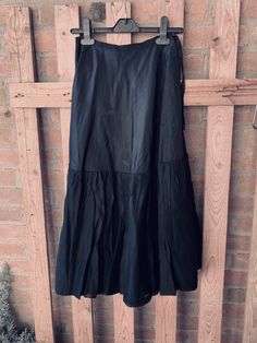 "This is an old underskirt, a petticoat, I guess from 30's, tailored and hand-stitched, black silk or satin with ruffles. In the past it was wearing under the clothes to \"puffing\", to give volume to the lower part of the clothes with very narrow waist. It can be also wear as is with texani boots for a gorgeous cow-girl style ! or with doc marten's and black leather jacket for a rockers look SO COOL SIZE unknown Approx measures : Waist line 11.82\" hips line 24.43\" hem line 43.34\" Length 30.3 Satin Long Skirt, Edwardian Shoes, Narrow Waist, Rocker Look, Satin Noir, Look Rock, Black Maxi Skirt, Style Rock, Rocker Style