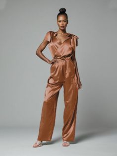 Terracotta Chic Satin V-neck Jumpsuits And Rompers, Chic Satin Jumpsuits And Rompers In Solid Color, Chic Solid Color Satin Jumpsuits And Rompers, Fitted Satin Jumpsuits And Rompers For Work, Elegant Satin Jumpsuits And Rompers For Workwear, Elegant Satin Jumpsuit Or Romper In Solid Color, Chic Formal Satin Jumpsuits And Rompers, Chic Satin Jumpsuits And Rompers With V-neck, Formal Satin V-neck Jumpsuit