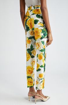 Vibrant blooms flourish all over ankle-length pants crafted in Italy from a lightweight silk blend. Zip fly with button closure Front slant pockets 74% silk, 26% rayon Dry clean Made in Italy Designer Clothing Ankle Trousers, Dolce And Gabbana Fashion, Printed Trousers, Print Pants, Ankle Length Pants, Romantic Style, High Waisted Trousers, Printed Pants, Rose Print