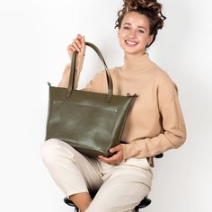 Handcrafted Olive Tote Bag Elevate your fashion game with our olive leather tote bag. This generously sized tote boasts a roomy exterior pocket, making it your ideal daily companion, especially when you're toting your laptop. It not only offers practicality but also keeps you at the forefront of style. Crafted from enduring full-grain leather with an elegant matte olive finish, this tote is a testament to durability. Handmade with Devotion: Our dedicated team from The Netherlands puts their hear Khaki Tote Satchel For Everyday, Green Tote Weekender Bag For On-the-go, Everyday Khaki Satchel With Zipper Pocket, Modern Khaki Tote Shoulder Bag, Everyday Green Satchel With Zipper Pocket, Green Everyday Satchel With Zipper Pocket, Khaki Leather Shoulder Bag For Everyday, Everyday Use Khaki Leather Bag, Modern Khaki Tote Bag