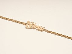 A perfect gift for someone special! This 14K solid gold Cuban Chain Bold Name Bracelet is a wonderful and thoughtful piece of jewelry that will be cherished forever. It is personalized with a name or other word(s) of the recipient's choosing. FEATURES • Material: 14k Solid Gold (Stamped 14K for authenticity) • Color Options: Yellow Gold • Chain Style: Cuban Curb Chain • Chain Width: 3.00 mm • Clasp Type: Lobster Clasp • Available Lengths: 5", 5.5", 6", 6.5", 7", 7.5", 8" For custom lengths feel Gold Sterling Silver Bracelet With Custom Name, Customizable Gold Name Bracelet In Sterling Silver, Customizable Gold Colored Sterling Silver Name Bracelet, Dainty 14k Gold Engraved Bracelet, Dainty Custom Name Bracelet In 14k Gold, Personalized Gold Sterling Silver Name Bracelet, Customizable Gold Sterling Silver Bracelet, Customizable Gold Sterling Silver Bracelets, Dainty 14k Gold Bracelet With Custom Name