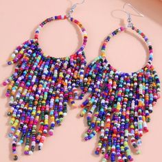 Color Block Plastic Beaded Tassel Earrings Height= 5 In Width= 1.6 Purple Colorful Beaded Earrings For Festival, Party Earrings With Colorful Beads, Festival Purple Beaded Earrings, Party Colorful Beaded Earrings, Colorful Dangling Beads Earrings For Party, Colorful Beaded Dangling Earrings For Party, Purple Beaded Earrings With Colorful Beads, Purple Beaded Dangle Earrings, Bohemian Multicolor Beaded Earrings For Party