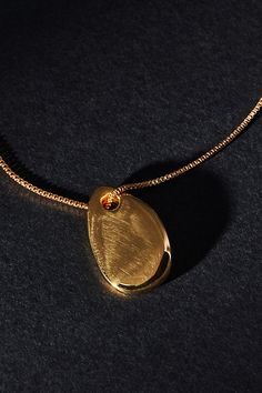 Gold: 14k gold-plated brass Silver: Sterling silver Clasp styling Imported | Small Pebble Pendant Necklace by Maslo in Gold, Women's, Gold/Plated Brass/Sterling Silver at Anthropologie Pebble Pendant, Small Pendant, Diamond Pendant Necklace, Silver Sterling, Gold Pendant Necklace, Silver Pendant Necklace, Diamond Pendant, Precious Metals, Silver Necklaces