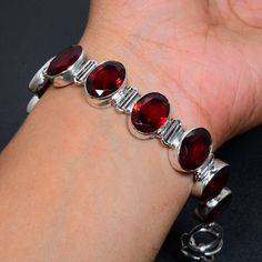 Red Garnet Bracelet Red Garnet Gemstone Handmade 925 Sterling Silver Bracelet Red Garnet Bracelet For Gift Red Garnet Bracelet For Her * PRODUCT INFORMATION ● Gemstone : Red Garnet ● Bracelet Length ( Inches . ) : 8 ● Main Stone Creation : Natural ● Metal : 925 Sterling Silver ● Purity : 925 Parts Per 1000 ● 925 Stamped : Yes ● Silver Polish : High * Benefits Of Wearing Silver As a metal, silver has significant health benefits that have been used across cultures for centuries. Silver has a prove Red Gemstone Bracelets As Gift, Red Gemstone Bracelets For Gift, Handmade Red Ruby Bracelets, Red Garnet Bracelets As Gift, Red Garnet Bracelet Gift, Red Faceted Oval Jewelry, Red Garnet Bracelet As Gift, Red Garnet Bracelet For Gift, Faceted Oval Red Jewelry